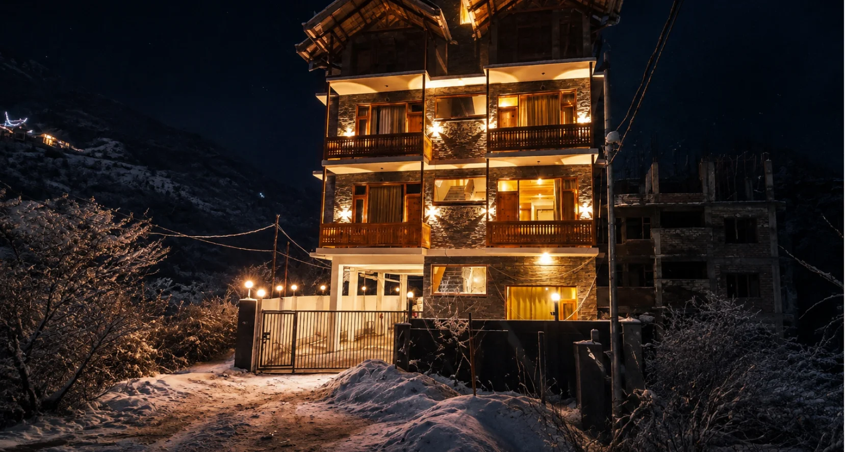 The Cordillera Hotel building at night